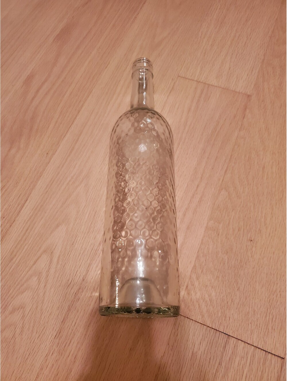 Clear Textured Glass Bottle with Honeycomb Pattern
